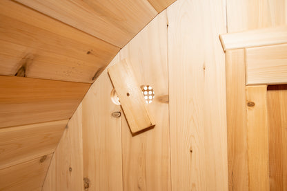 Inside of barrel sauna showing fresh air vent