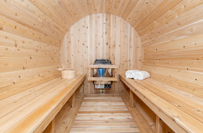 Wooden sauna with benches and towels