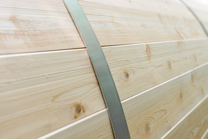 Close-up of wooden panels with a metal strip running horizontally.