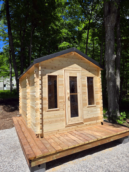 Cabin sauna with changeroom, 2 windows and glass in door. 