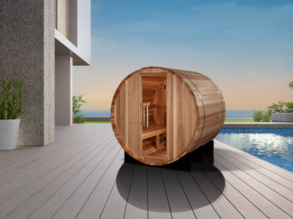 Golden Designs "St. Moritz" 2 Person Barrel Traditional Sauna pictured from front on a deck next to a pool and house. 
