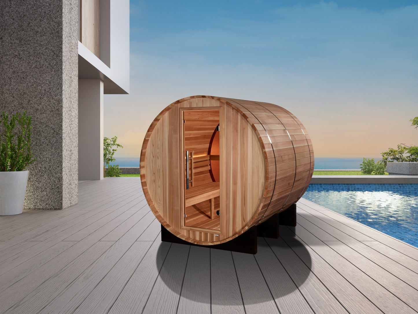 Golden Designs "Zurich" 4 Person Barrel sauna pictured next to a pool on a deck. 