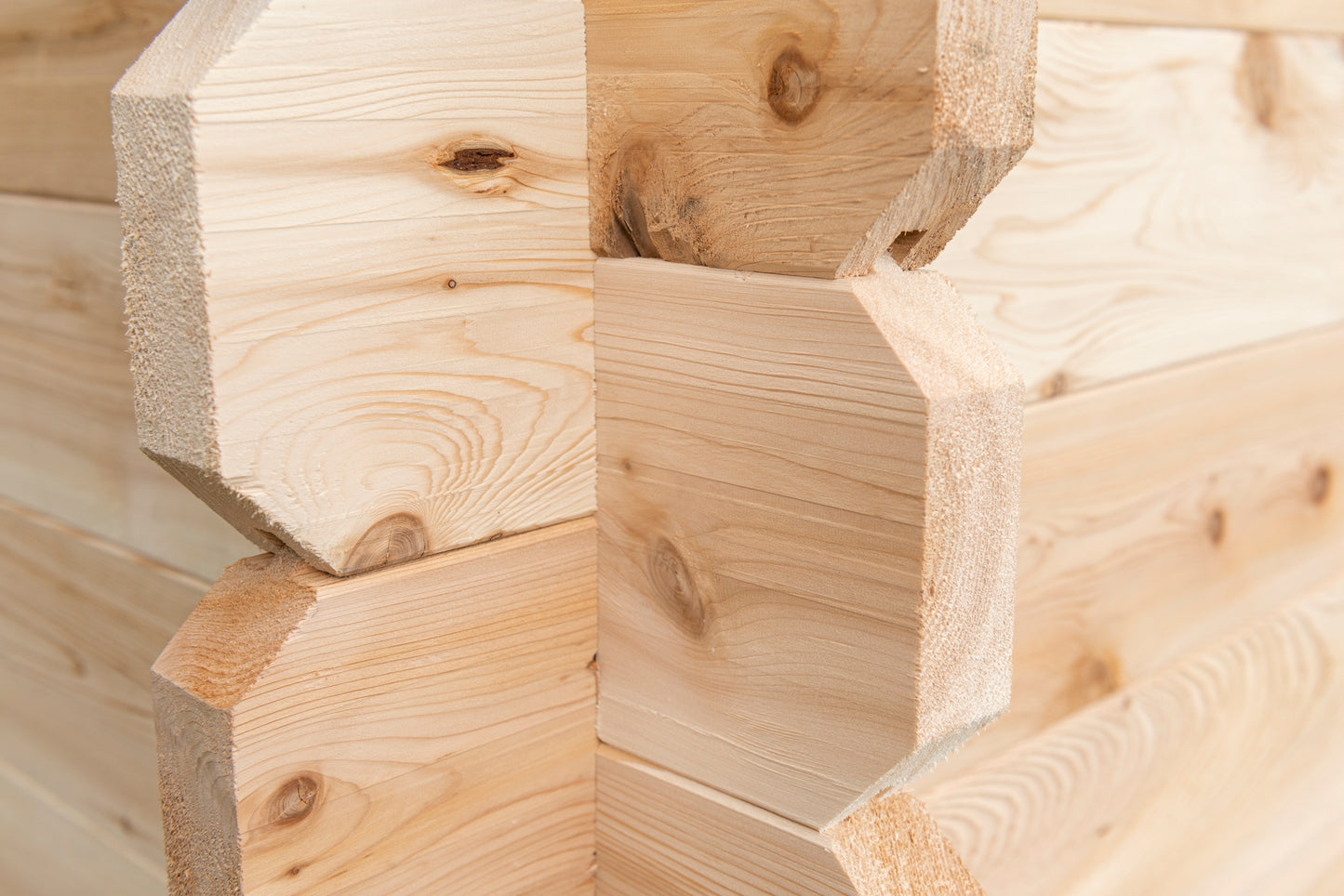 Close-up of wooden building blocks with visible grain and texture.