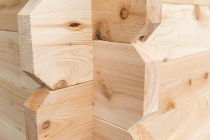 Close-up of wooden building blocks with visible grain and texture.
