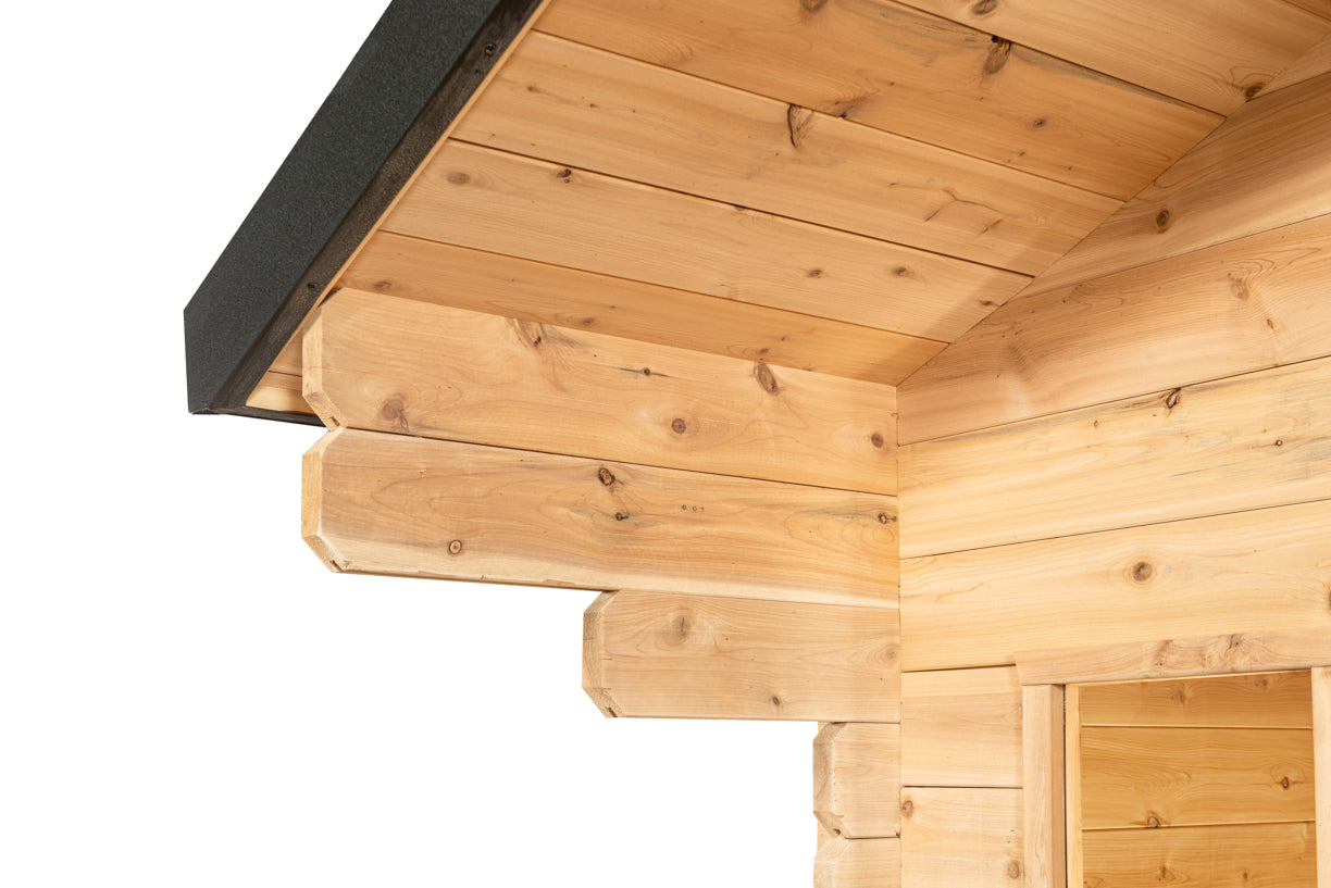 Wooden cabin corner with visible grain and texture