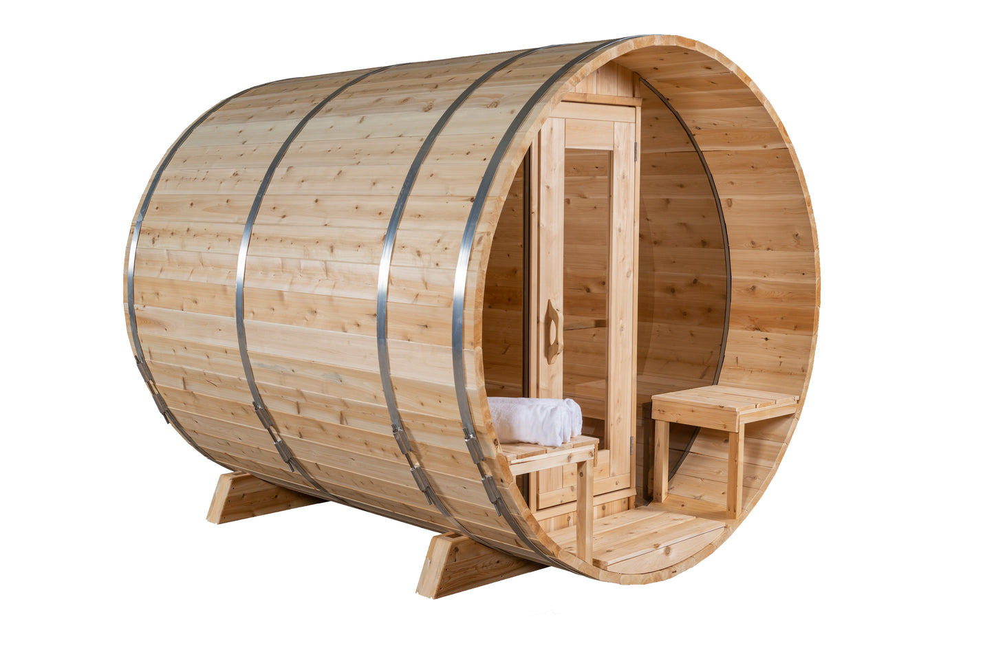 Wooden barrel sauna with interior bench and towel on a white background